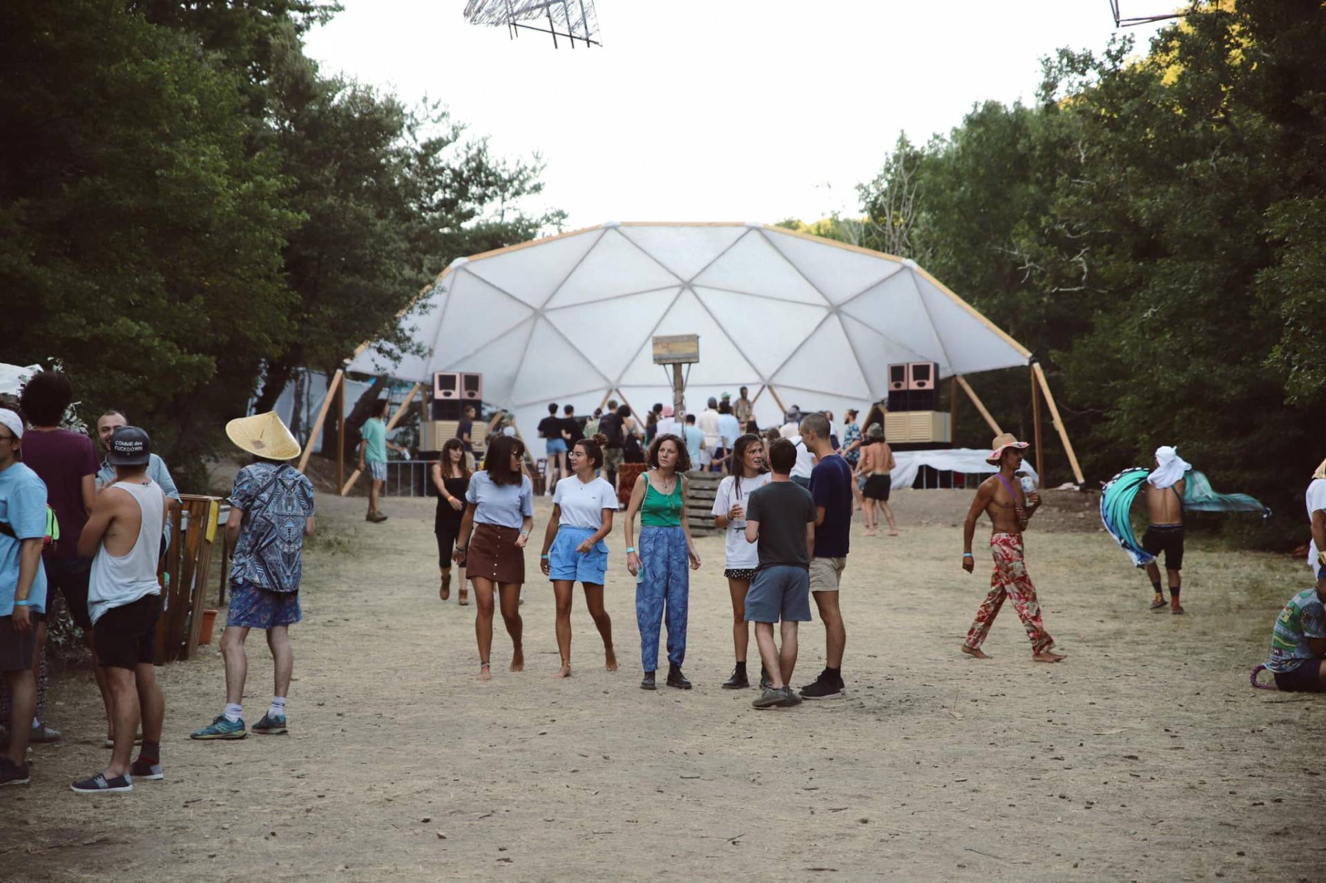 La Vallée Electrique festial with geodesic dome and festival goers